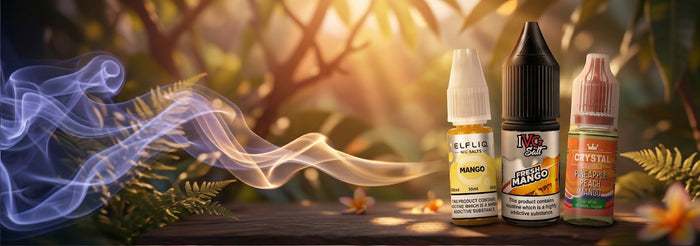 Three e-liquid bottles from the brand Eulflie are displayed on a wooden surface with a stylized forest background and a blue smoke effect. The bottles are labeled Mango, Mango Ice, and Crystal Mango.