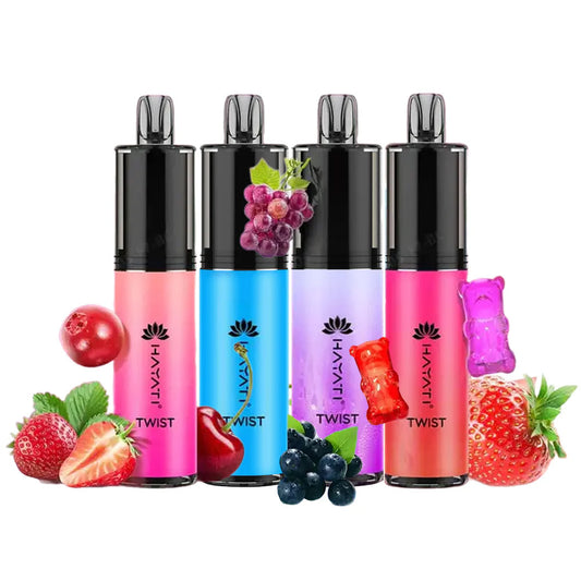 Four colorful vape pens labeled "Hayat Twist" surrounded by fresh fruits and candy, showcasing various flavor options.