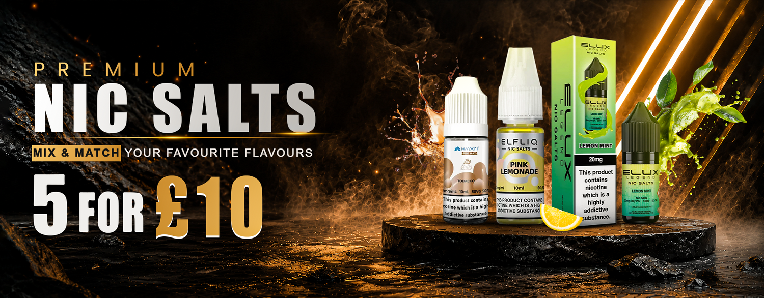 Promotional banner for premium nic salts vape products, featuring three small bottles and a box on a dark wooden pedestal with smoke effects and bright light streaks. Large text reads 'PREMIUM NIC SALTS', 'MIX & MATCH YOUR FAVOURITE FLAVOURS', '5 FOR £10', and visible flavor names include Mango, Papaya, and Lemon.
